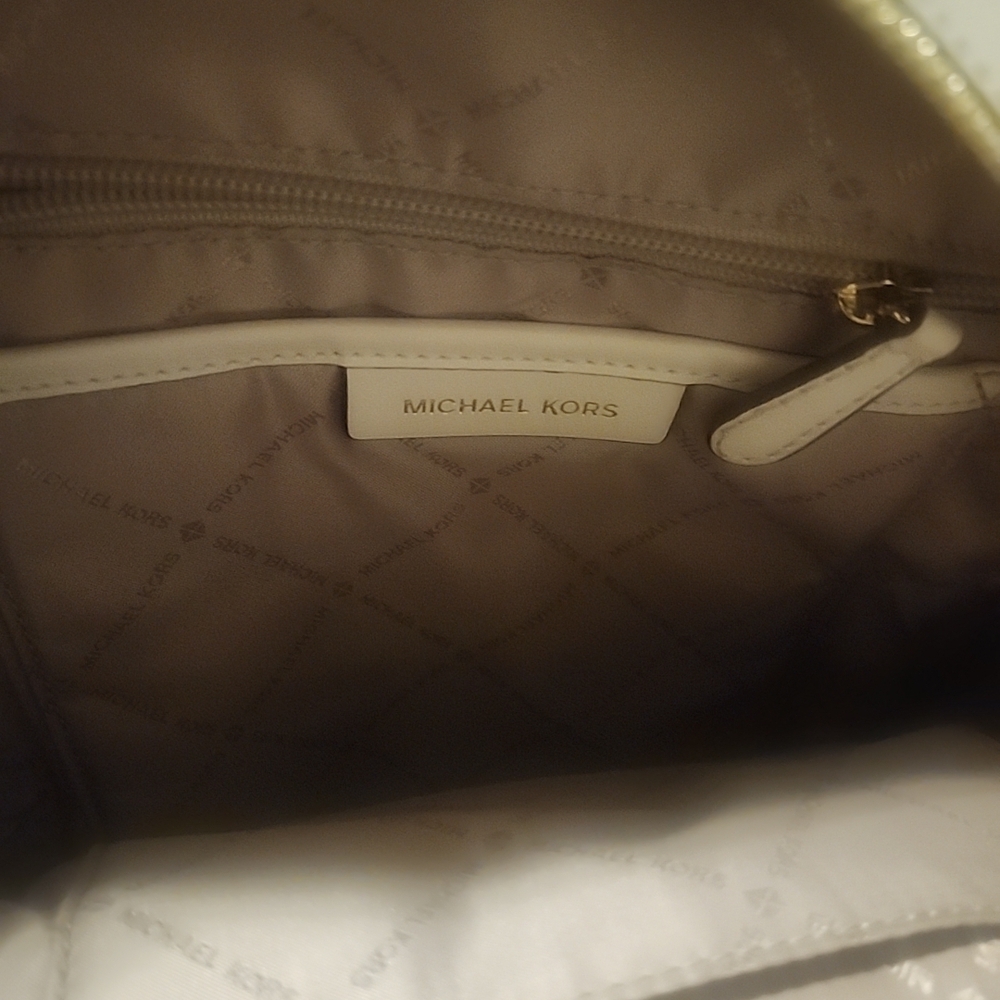 Michael Kors Cream Monogram Backpack with Gold Accents - Picture 16 of 16
